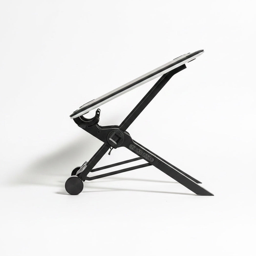 The Remote Desk portable folding laptop stand in black nylon with non-slip contact points, side view