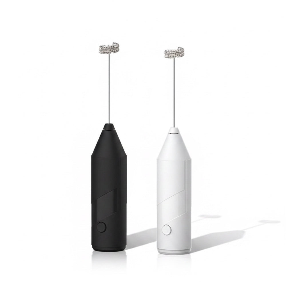 The Remote Desk USB rechargeable handheld milk frothers in black and white with stainless steel whisk attachments.